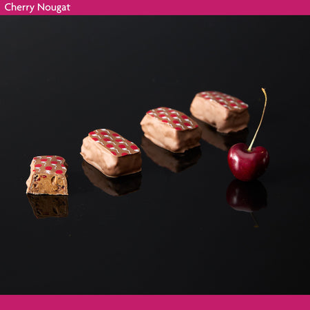 Cherry nougat with a cherry on a black background
