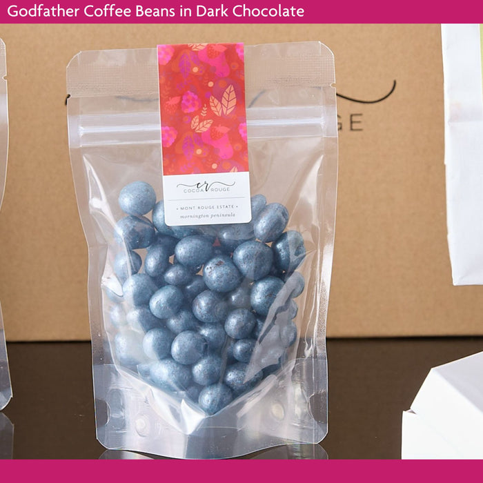 Packaged coffee beans in dark chocolate.